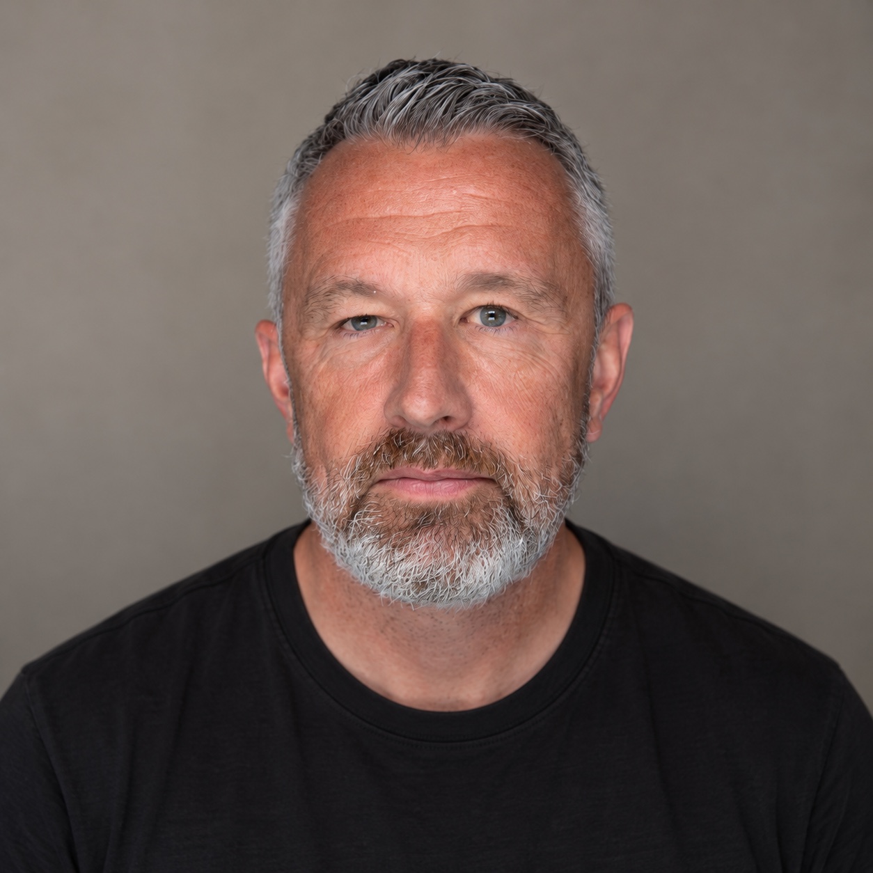 Andy Hayes, founder of Blast47, in a plain black T-shirt.